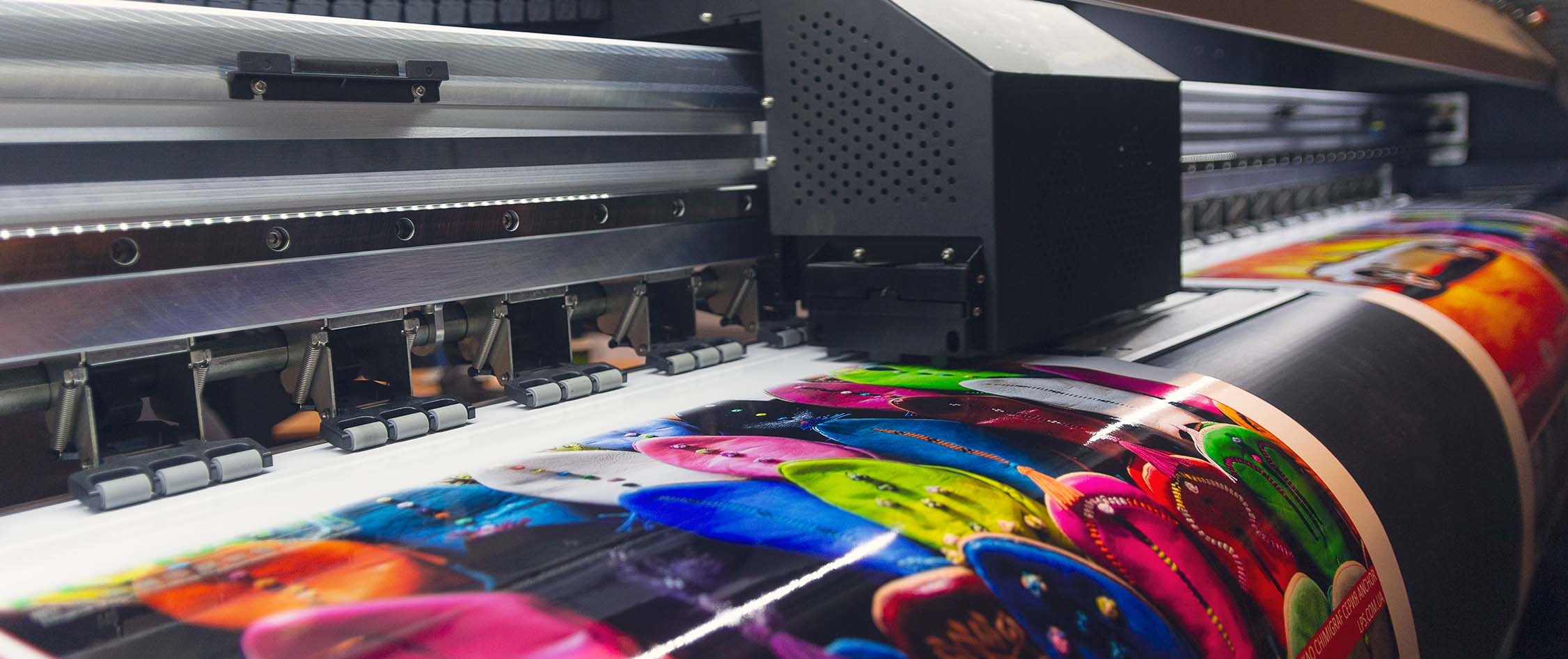 Printing press in action showing vibrant colors